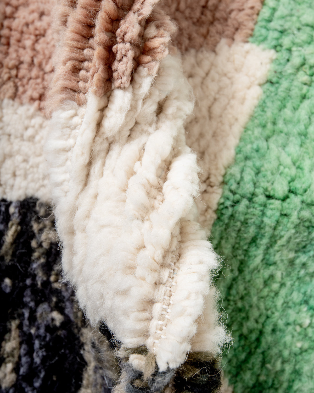 Modern, designer, handcrafted Berber rug from Morocco. Beniourain carpet with beautiful colours and patterns and fluffy wool texture.